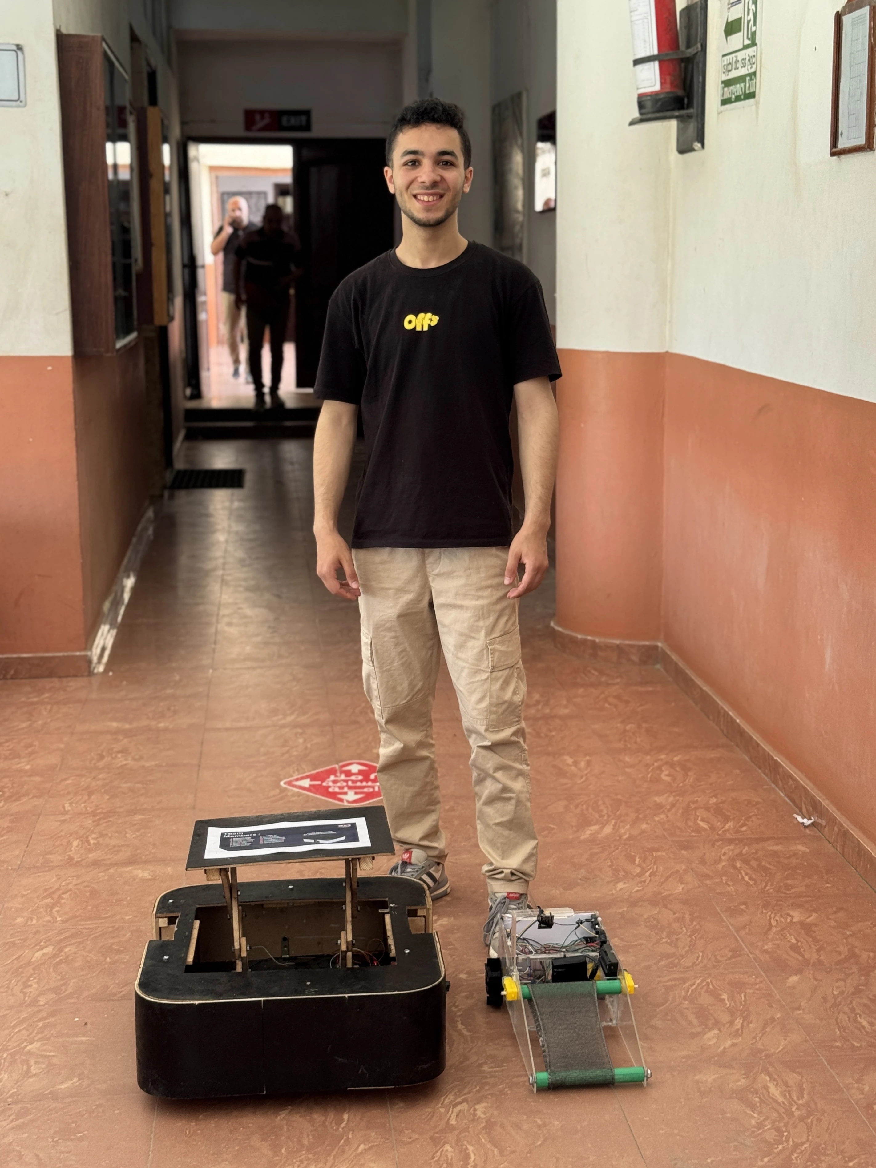 Mohamed Sakr showcasing two robot prototypes he built — Sakr Makes hardware engineering and maker projects